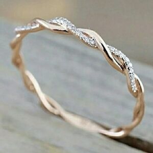 Twisted Rose Gold Ring with Sparkling Accents